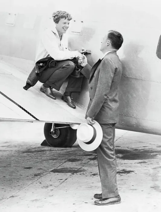 Framed Print : Amelia Earhart and Husband George Putnam Saying Goodbye Framed Print : Amelia Earhart and Husband George Putnam Saying Goodbye