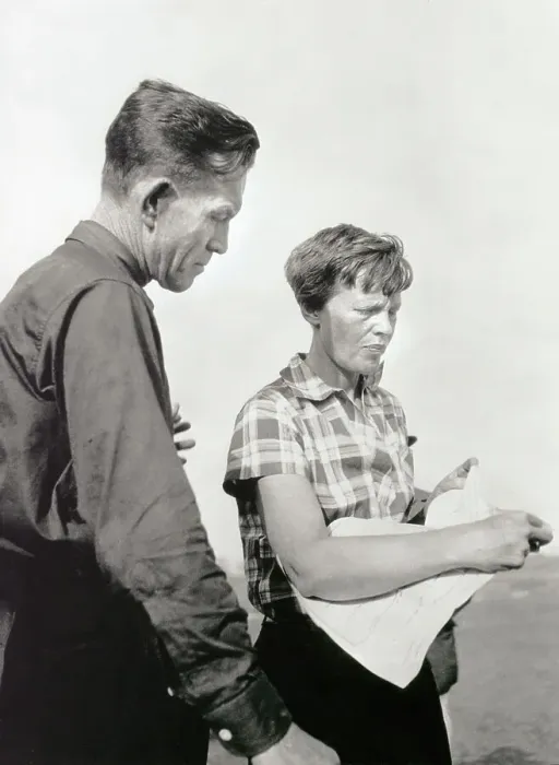 Framed Print : Amelia Earhart Putnam and Fred Noonan Looking over Map Framed Print : Amelia Earhart Putnam and Fred Noonan Looking over Map