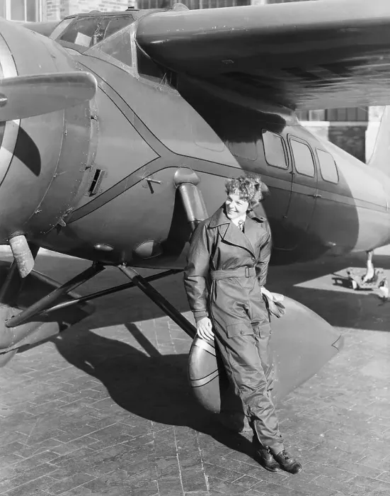 Framed Print : Amelia Earhart Shown With Her Airplane