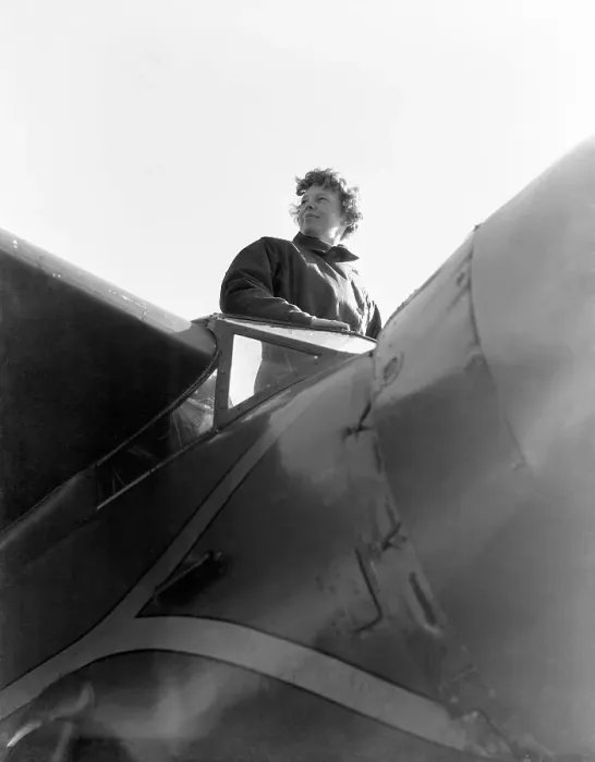 Framed Print : Amelia Earhart Standing In Airplane Framed Print : Amelia Earhart Standing In Airplane