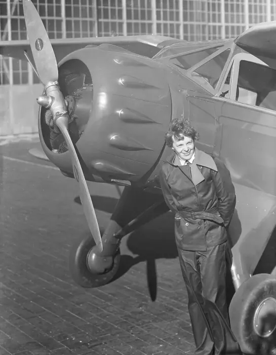 Framed Print : Amelia Earhart Stands By Plane Propeller Framed Print : Amelia Earhart Stands By Plane Propeller