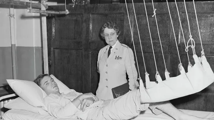 Framed Print : American Army Nurse with Soldier as Patient Framed Print : American Army Nurse with Soldier as Patient