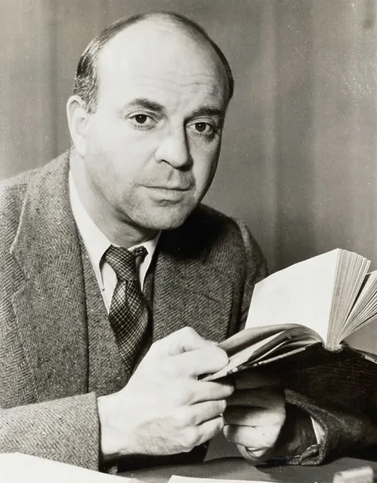 Framed Print : American Author John Dos Passos Pausing with Book in Hand Framed Print : American Author John Dos Passos Pausing with Book in Hand