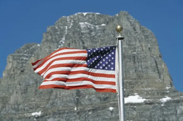 Framed Print : American Flag Flies In Front Of Clements Mountain, Montana, Usa