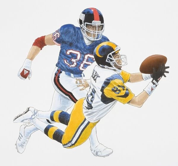 American football player diving forward to catch ball chased closely by player from opponent team, side view