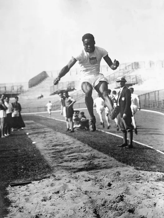 Framed Print : American Hubbard Wins Olympic Long Jump Framed Print : American Hubbard Wins Olympic Long Jump