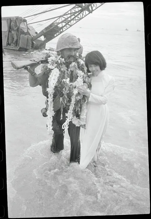Framed Print : American Marine on Vietnam Tour Receiving a Welcoming Flower Framed Print : American Marine on Vietnam Tour Receiving a Welcoming Flower