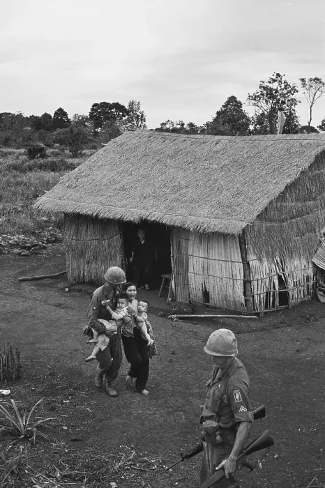 Framed Print : American Paratroopers Evacuating Vietnamese Family Framed Print : American Paratroopers Evacuating Vietnamese Family