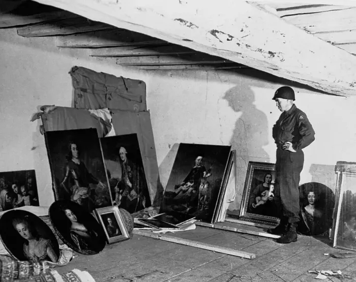 Framed Print : American Soldier Looking at Stolen Paintings Framed Print : American Soldier Looking at Stolen Paintings