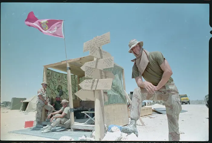 Framed Print : American Soldier Propped on Sign in Saudi Arabia Framed Print : American Soldier Propped on Sign in Saudi Arabia