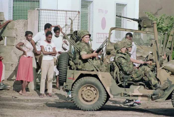 Framed Print : American Soldiers Drive Past Civilians in Grenada Framed Print : American Soldiers Drive Past Civilians in Grenada