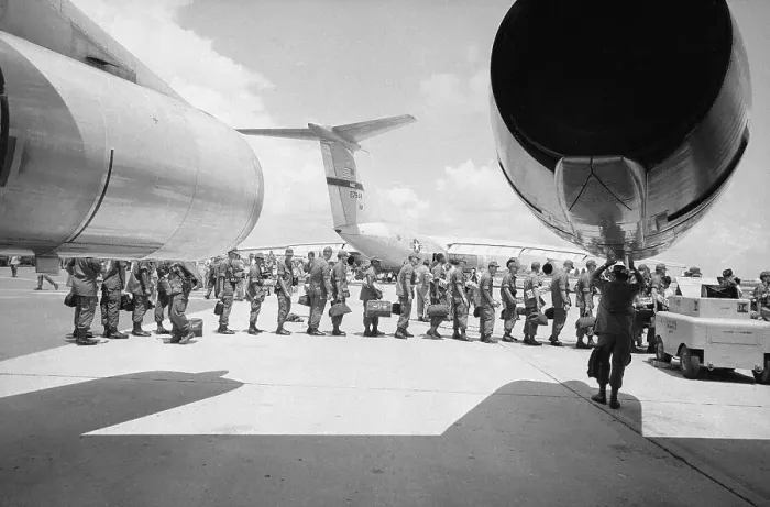 Framed Print : American Troops Boarding A Jet