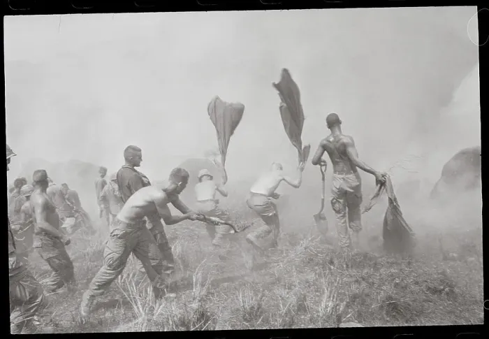 Framed Print : American Troops Putting out Field Fire Framed Print : American Troops Putting out Field Fire