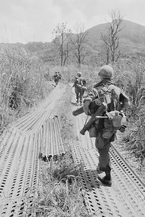 Framed Print : American Troops Trekking Through Metal Strip Pathway Framed Print : American Troops Trekking Through Metal Strip Pathway