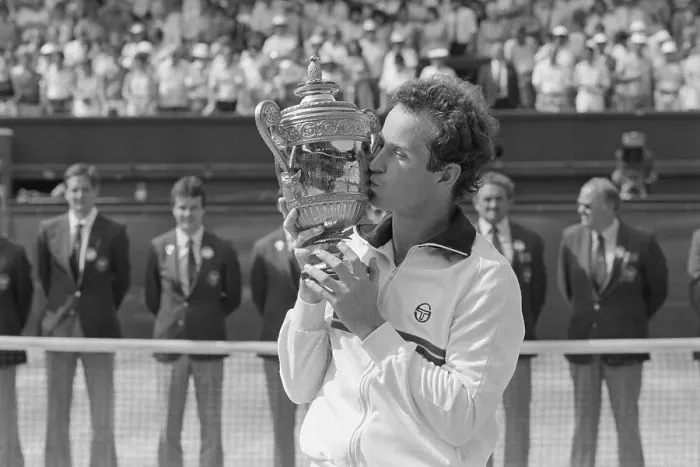 Framed Print : America's John McEnroe Holding Trophy Framed Print : America's John McEnroe Holding Trophy