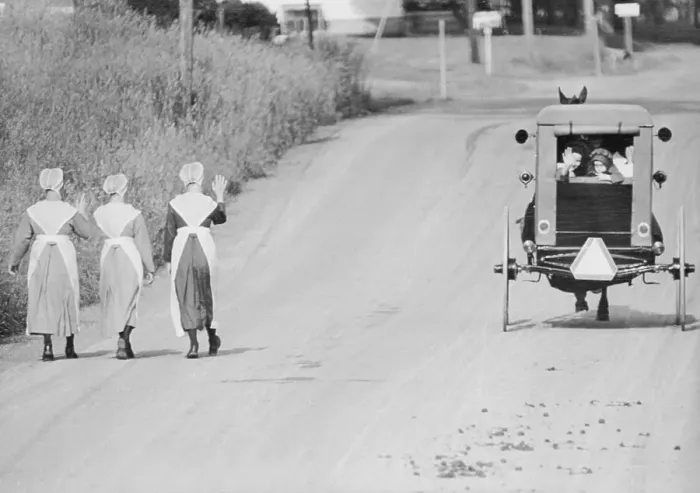 Framed Print : Amish Women Walking Wave To Buggy Framed Print : Amish Women Walking Wave To Buggy