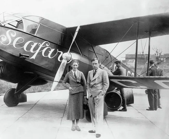Framed Print : Amy and James Mollison Posing by Airplane Framed Print : Amy and James Mollison Posing by Airplane