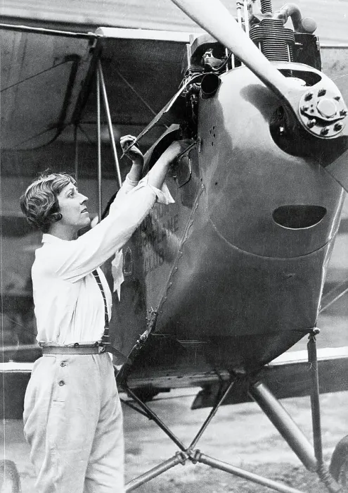 Framed Print : Amy Johnson Looking Over Her Plane Framed Print : Amy Johnson Looking Over Her Plane