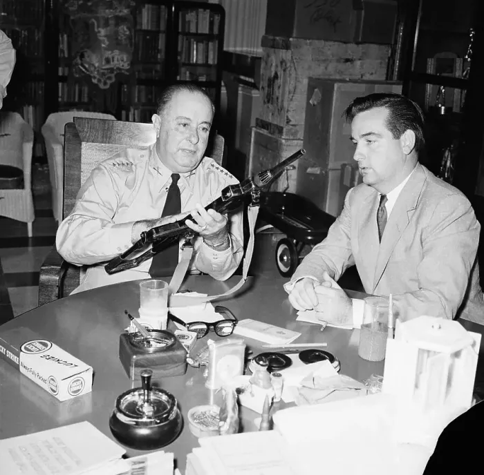 Framed Print : Anastasio Somoza with Gun and Reporter Framed Print : Anastasio Somoza with Gun and Reporter