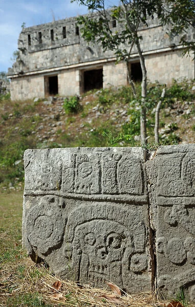 Ancient Mayan skull carving and temple, Uxmal