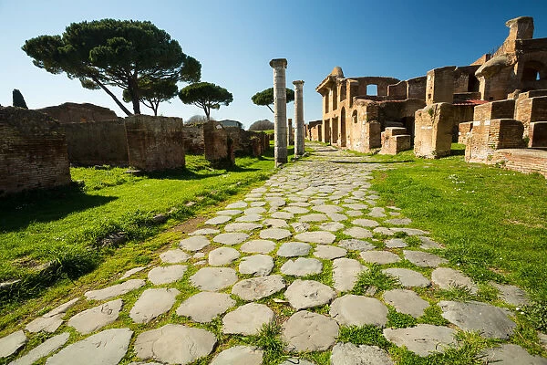 An ancient road in the ruins of the Ancient Roman harbour city of Ostia Antica in Rome, Italy