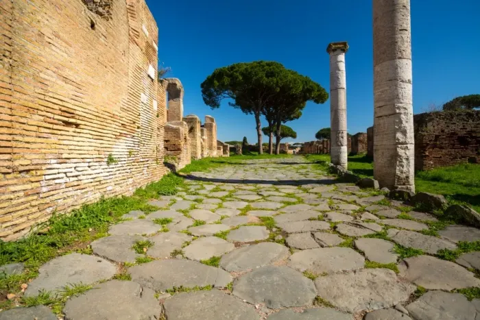 Framed Print : An ancient road in the ruins of the Ancient Roman harbour city of Ostia Antica in Rome, Italy