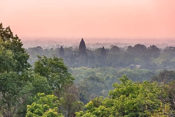 Angkor Wat temples in the forest at sunset, Cambodia