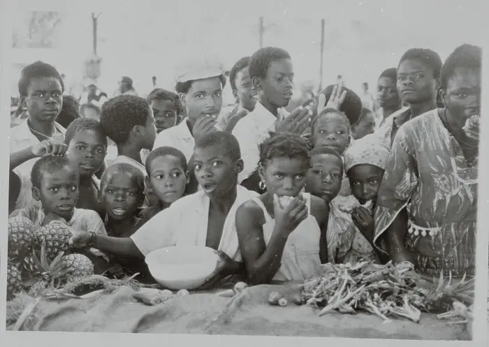 Framed Print : Angolians Enjoying Pineapple at Market Framed Print : Angolians Enjoying Pineapple at Market