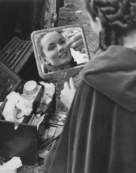 Framed Print : Ann Blyth. A make-up artist works on American actress Ann Blyth on the