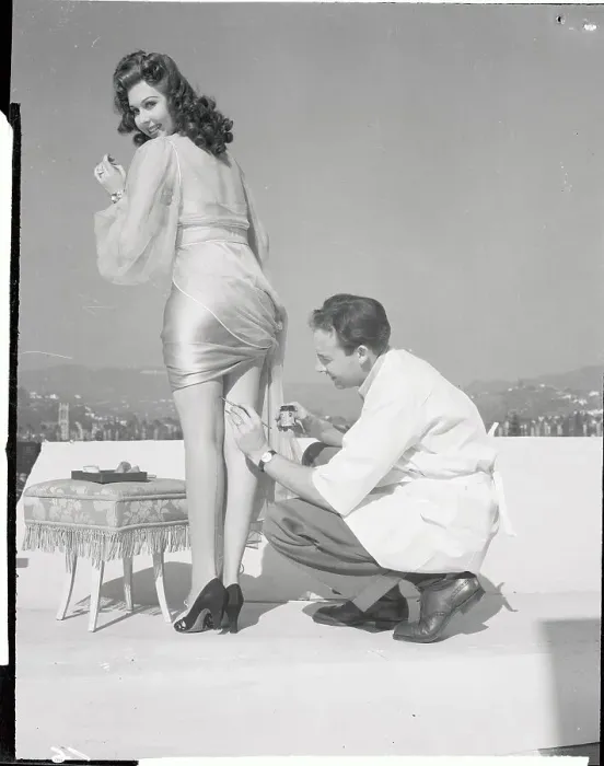 Framed Print : Ann Miller Having Stockings Applied Framed Print : Ann Miller Having Stockings Applied