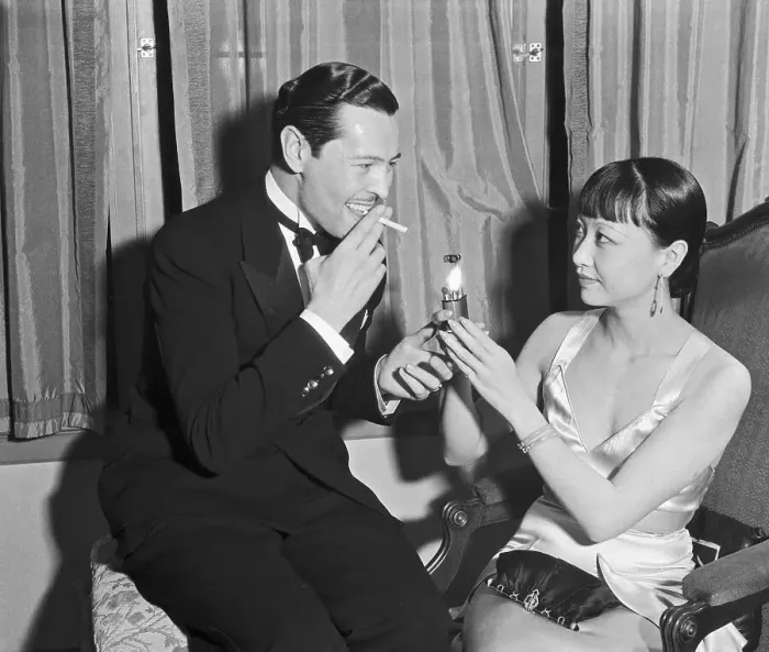 Framed Print : Anna May Wong Assisting with Lighter Framed Print : Anna May Wong Assisting with Lighter