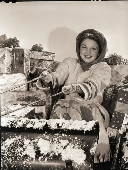 Framed Print : Anne Baxter Riding in Santa's Sleigh Framed Print : Anne Baxter Riding in Santa's Sleigh