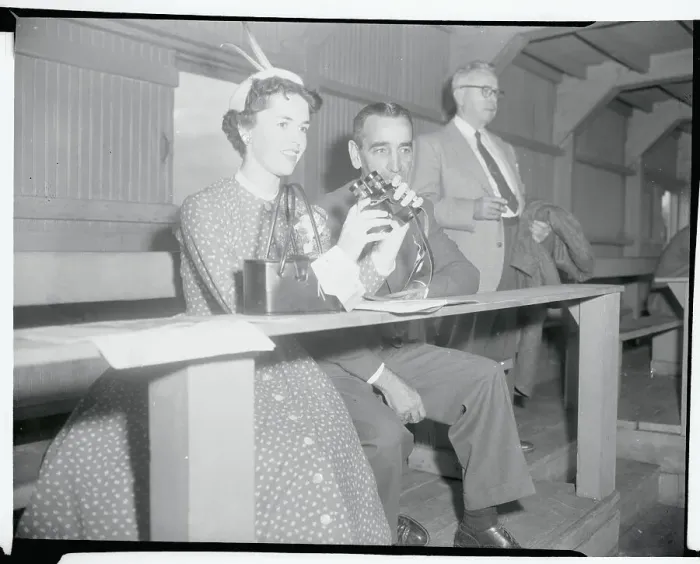 Framed Print : Anne Morrisy Holding a Pair of Binoculars Framed Print : Anne Morrisy Holding a Pair of Binoculars