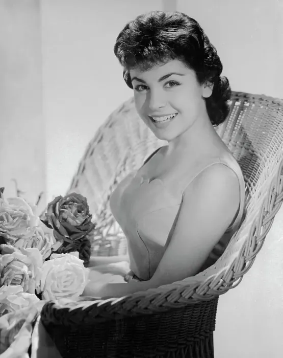 : Annette Funicello Sitting with Flowers : Annette Funicello Sitting with Flowers