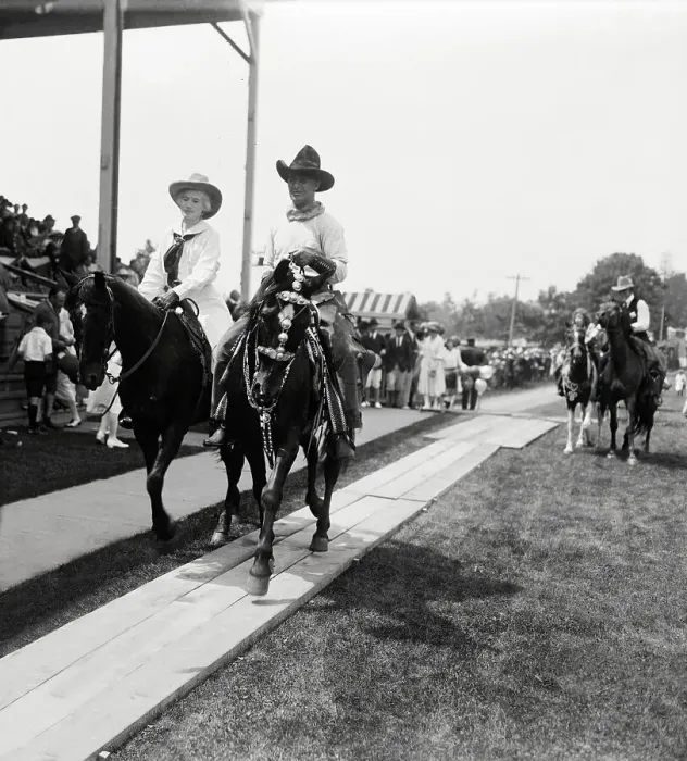 Framed Print : Annie Oakley and Fred Stone Riding into Stadium