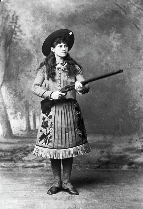 Framed Print : Annie Oakley Holding a Rifle Framed Print : Annie Oakley Holding a Rifle