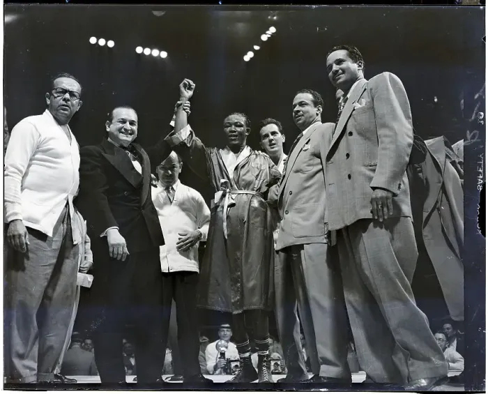 Framed Print : Announcer Raises Kid Gavilan's Arm Framed Print : Announcer Raises Kid Gavilan's Arm