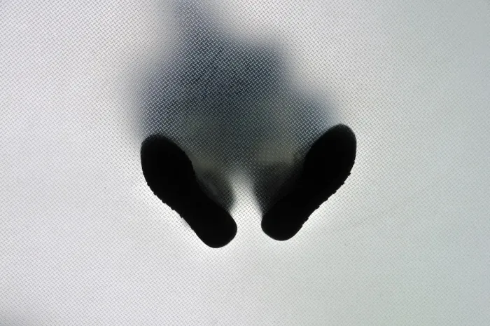 Framed Print : Anonymous standing person from below