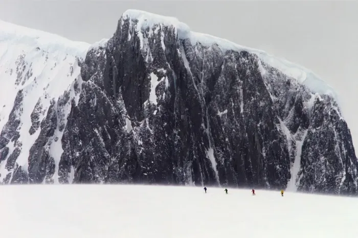 Framed Print : Antarctica, Palmer Peninsula, climbers skiing towards mountain, summer Framed Print : Antarctica, Palmer Peninsula, climbers skiing towards mountain, summer