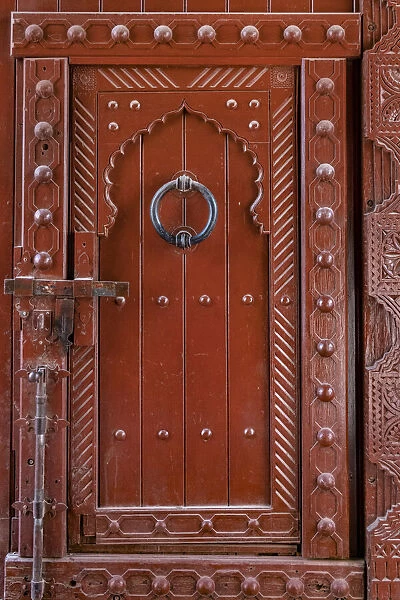 Antique looking traditional Omani style door in Nizwa, Central Oman