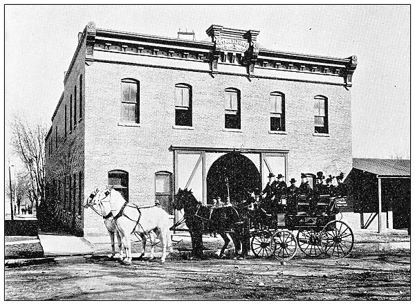 Antique photograph from Lawrence, Kansas, in 1898: Donnelly Bros Livery stable