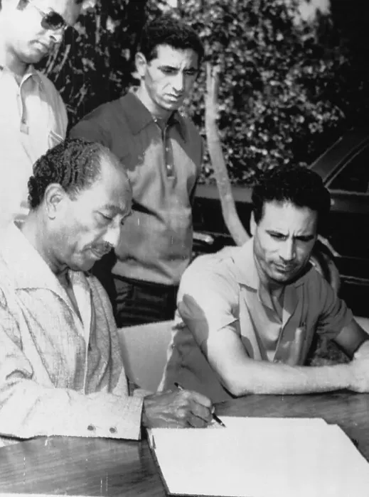 Framed Print : Anwar Sadat and Muammar al-Qaddafi