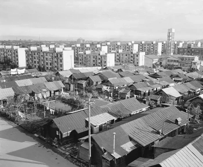 Framed Print : Apartment Buildings and Wooden Shacks Framed Print : Apartment Buildings and Wooden Shacks