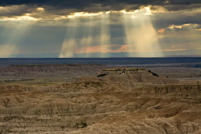 Framed Print : Approaching storm and sunbeams, Badlands National Park, South Dakota, USA