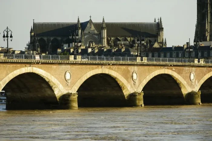 Framed Print : Arch bridge over a river, Pont De Pierre, St. Michel Basilica, Garonne River, Bordeaux, Aquitaine, France Framed Print : Arch bridge over a river, Pont De Pierre, St. Michel Basilica, Garonne River, Bordeaux, Aquitaine, France