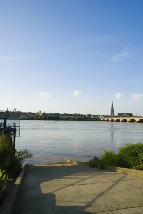 Framed Print : Arch bridge across a river, Pont De Pierre, St. Michel Basilica, Garonne River, Bordeaux, Aquitaine, France