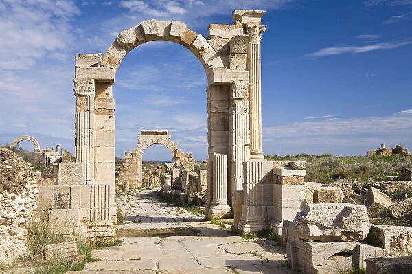 Arch of Trajan on Via Trionfale, Arch of Tiberius in the back, Leptis Magna, Libya, North Africa
