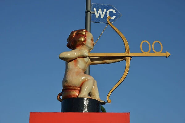 Archer Cupid as a toilet sign, Oktoberfest, Munich, Upper Bavaria, Bavaria, Germany