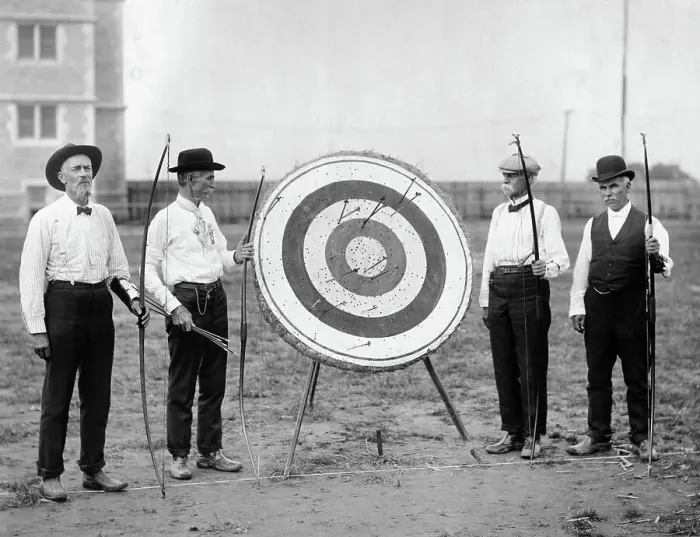 Framed Print : Archers Holding Bows Beside Target Framed Print : Archers Holding Bows Beside Target