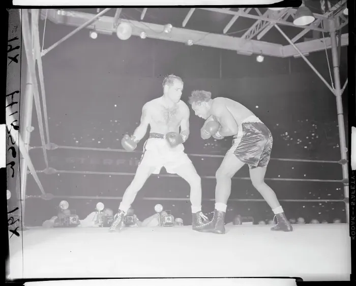 Framed Print : Archie Moore Blocking a Punch Framed Print : Archie Moore Blocking a Punch